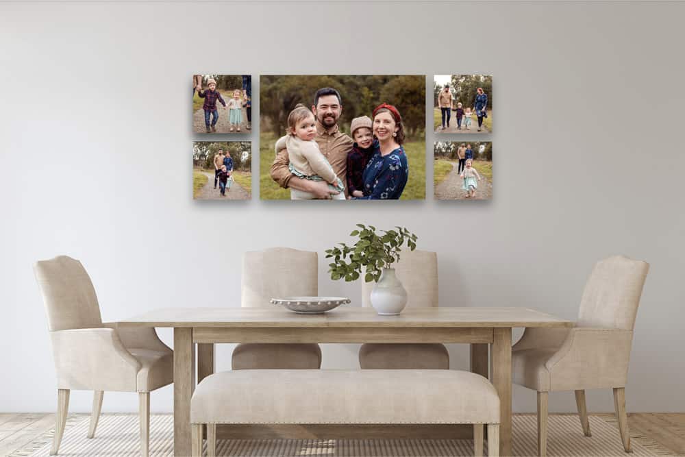 Collection of 5 natural family photos hanging on a wall above dining room table in Melbourne